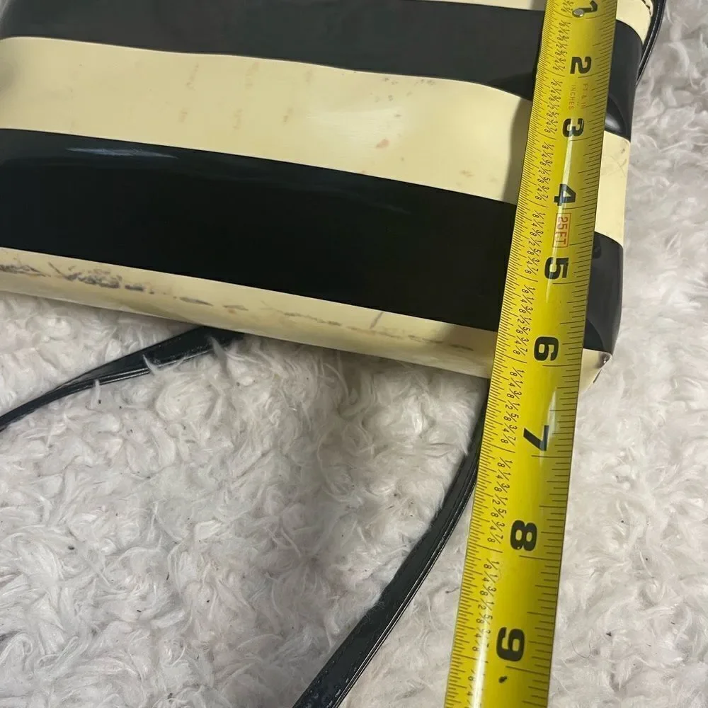 Kate Spade patent Black and Cream Striped small Crossbody Bag.